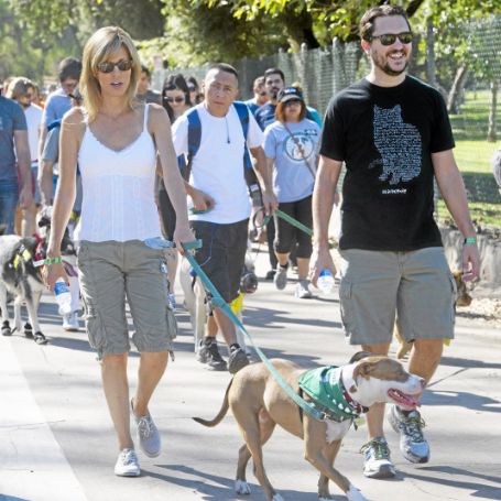 Wil and his wife taking their dog for a walk